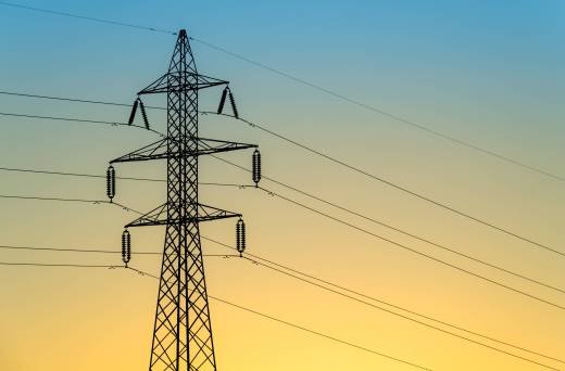 Shot of an electric tower during a sunset.